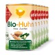 Dosen mit biologischem Hühner-Hundefutter, beschriftet mit "Bio-Huhn", mit Zutaten wie Hirse und Zucchini, die gluten- und laktosefrei sind.