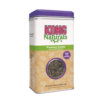Boîte métallique KONG Naturals Premium Catnip avec couvercle violet, bande verte, fenêtre ronde montrant l'herbe à chat et pastille « JOUET GRATUIT À L'INTÉRIEUR ».