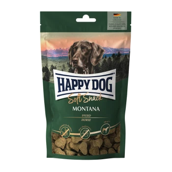 Un sac de Happy Dog Soft Snack Montana pour chiens, présentant un chien brun sur le devant, avec le texte "PFERD" (Cheval) et "Fabriqué en Allemagne."