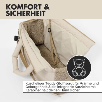 Beiger Haustierträger mit weichem Teddyfutter und integriertem Leinenkarabiner für Hundesicherheit, Text auf Deutsch.