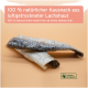 Luftgetrocknete Lachshaut-Leckerlis auf einem Pfirsichhintergrund mit Text in Deutsch und Englisch über ihre natürlichen Zutaten.