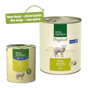 Two cans of Real Nature dog food, one large and one small, lamb flavor with potatoes and carrots. "New design - same quality!" text.