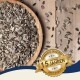 Eine Holzschale gefüllt mit Sonnenblumenkernen, mit einigen Kernen, die auf einer Holzoberfläche verstreut sind. Ein Abzeichen liest "Beste Qualität" und "10 Jahre" auf Deutsch.