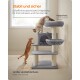 Eine Katze, die auf einem mehrstöckigen Katzenbaum mit einem gemütlichen Bett und Kratzpfosten klettert, mit Text über Stabilität und Sicherheit auf Deutsch.