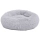 Flauschiges graues rundes Haustierbett mit weicher Textur, entworfen für Komfort und Entspannung.