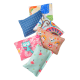 Eine Sammlung von bunten Stoffhaustierspielzeugen in verschiedenen Mustern, darunter Punkte, Eulen und florale Designs, die zusammen angeordnet sind.