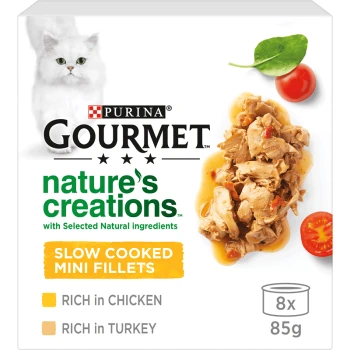 Purina Gourmet Nature's Creations cat food packaging featuring slow cooked mini fillets, rich in chicken and turkey, with a white cat image.