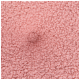 Nahaufnahme eines rosa lockigen Fleece-Haustierbetts mit einer kreisförmigen Vertiefung in der Mitte.