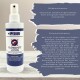 Weiße Sprühflasche mit der Aufschrift 'IPERON FLOHSCHUTZ LOTION' auf einem Holztisch, daneben deutsche Sicherheits- und Warnhinweisfelder.