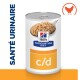Nourriture en conserve pour animaux de compagnie Hill's Prescription Diet c/d pour la santé urinaire, présentant une cuillerée de nourriture molle sur l'étiquette.