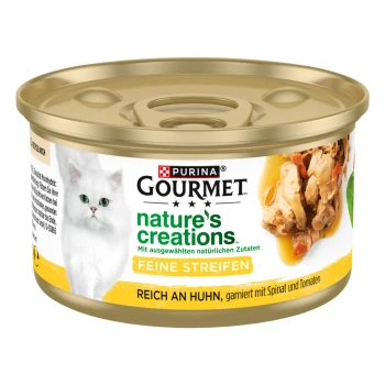 Dosenfutter für Katzen von Purina Gourmet, beschriftet mit "Naturkreationen", mit Huhn, Spinat und Tomaten.