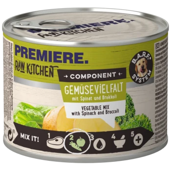 Une boîte de nourriture pour animaux "Premiere Raw Kitchen" avec un mélange de légumes de épinards et brocoli, présentant des instructions de mélange et "Composant : Gemüsevielfalt."