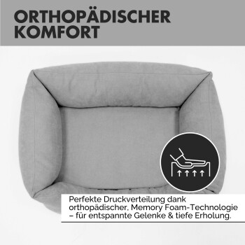 Nahaufnahme eines weichen, hellgrauen Haustierbetts mit einem schwarzen "PAW WOW"-Etikett und OEKO TEX Standard 100 PFC-frei Label.