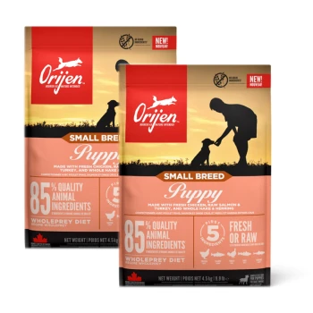 Deux sacs de nourriture pour chiots de petite race Orijen avec une silhouette de coucher de soleil d'une personne et d'un chien, présentant "85% Quality Animal Ingredients."