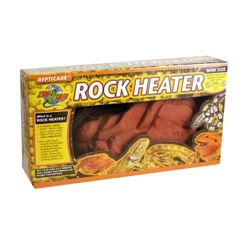 Verpacktes Reptilienzubehör, beschriftet mit "Rock Heater", mit Bildern verschiedener Reptilien, einschließlich eines Bartagamen und Schlangen, und Text, der seine Verwendung erklärt.