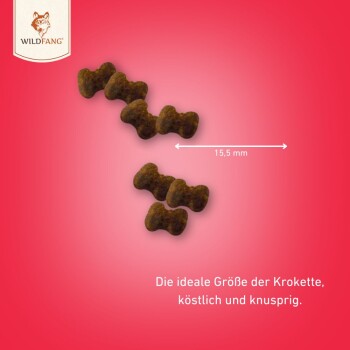 Braune Hundekibble in Knochenform, 15,5 mm groß, auf rotem Hintergrund mit dem Text: "Die ideale Größe der Krokette, köstlich und knusprig."
