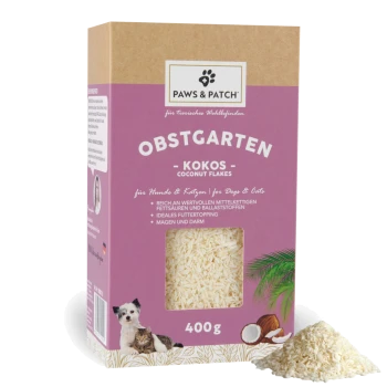 Paws & Patch Obstgarten Kokos Flakes-Topping für Haustiere, 400 g, Fenster zeigt die Flocken und einen Haufen neben der Schachtel