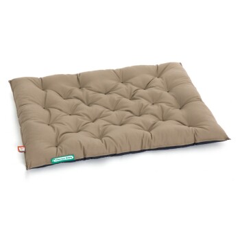 Ein plüschiges, gepolstertes Hundebett in neutralem Beige mit einer blauen Unterseite, das ein "Doctor Bark"-Etikett trägt.