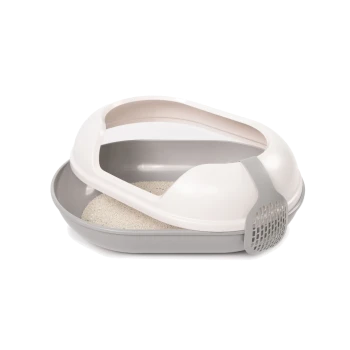 Eine moderne, oval geformte Katzentoilette in sanften Beige- und Grautönen, mit offenem Oberteil und einem angehängten Schaufel mit Schlitzen.