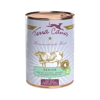 Dose Terra Canis Hundefutter mit der Aufschrift "Senior", die Rindfleisch mit Sellerie, Aprikose und Heilkräutern enthält, mit einer Kuhillustration.