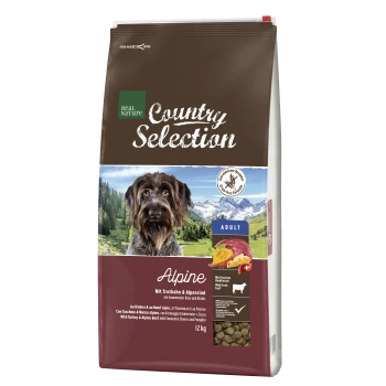 Hundefuttertüte "Real Nature Country Selection Alpine" mit braunem Hintergrund, Hundebild und Zutaten: Truthahn, Alpenrind, Käse, Kürbis. 12 kg.