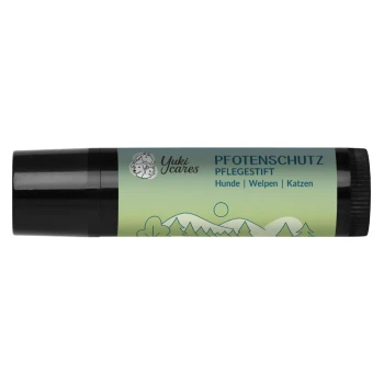 Yuki cares Pfotenschutz-Balsam in einer 5-ml-Tube mit einem hellblauen Etikett und schwarzem Deckel.