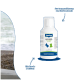Flasche Canina Lachsöl (Lachsöl) für Hunde & Katzen vor blauem Hintergrund; Etikett: "Canina", "LACHSÖL", "Für Hunde & Katzen".