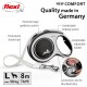 A "NEW COMFORT" flexi dog leash with sturdy tape, adjustable handle, and braking system, supports dogs up to 50 kg and extends 8m.