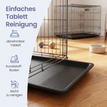 Metall-Haustierkäfig mit herausnehmbarem schwarzem Tablett auf Holzboden, Spielzeug und Napf; linker deutscher Text: 'Einfaches Tablett Reinigung'