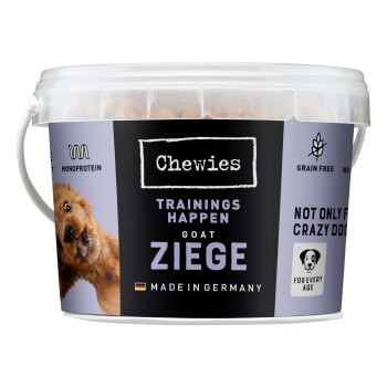 Behälter mit Chewies-Hundeleckerlis, beschriftet mit "Trainings Happen Goat Ziege", mit einem verspielten Hundebild, getreidefrei, hergestellt in Deutschland.