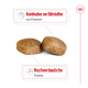 Hundefutter-Kibble-Stücke mit Text, der 'Kombination von Nährstoffen und Vitaminen' und 'Hochverdauliche Proteine' hervorhebt.