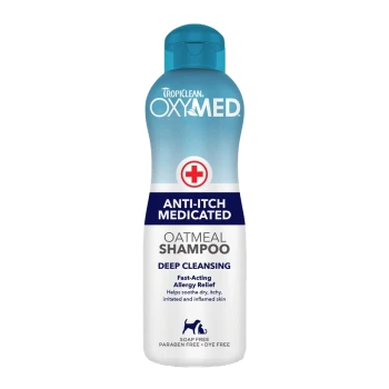 TropiClean OxyMed Anti-Itch Oatmeal Shampoo bottle with blue cap, labeled "Deep Cleansing" and "Fast-Acting Allergy Relief."