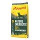 Eine 12,5 kg Tüte Josera Nature Energetic Hundefutter, mit einer Silhouette eines Hundes vor einem Waldhintergrund, gekennzeichnet mit "ADULT" und "GRAIN FREE."
