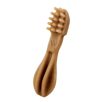 Brown dog toothbrush chew toy with rubber bristles, 'W' logo and split hollow handle.