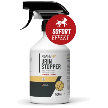 Eine 500ml Sprühflasche mit der Aufschrift "REAVET URIN STOPPER" mit einem roten "SOFORT EFFEKT" Aufkleber, hergestellt in Deutschland, verhindert das Markieren von Haustieren.