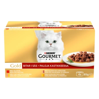 Flauschige weiße Katze mit grünen Augen auf gelbem Hintergrund, neben einem Teller mit "Purina Gourmet Gold" Katzenfutter.