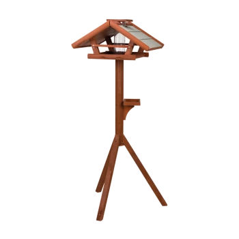 Holz-Vogelfutterspender mit schrägem Dach, der auf drei Beinen steht, mit einer Futterplatte und einem kleinen Stauraum.
