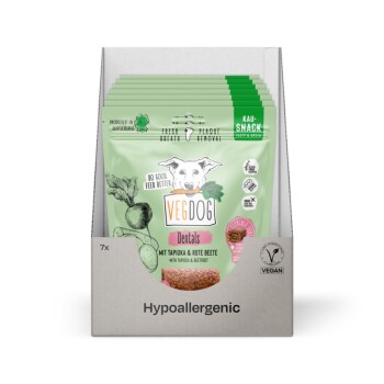 VegDog Dentals Verpackung mit einer Hundillustration, mit Text, der "Frischer Atem" und "Plaqueentfernung" hervorhebt, hergestellt aus Tapioka und Rote Beete.