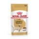 Emballage de nourriture pour chiens Royal Canin Adult Labrador Retriever, présentant une image de Labrador jaune, taille 140g, et étiquette "Poids Idéal."