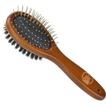 Brosse de toilettage en bois pour animaux de compagnie avec des poils en métal et une base en caoutchouc noir, portant le texte "TAKE CARE" sur la poignée.