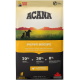 Sac de recette ACANA Puppy avec deux chiens dans un champ au coucher du soleil. Points forts : "70% ingrédients d'origine animale," "30% légumes," "0% additifs artificiels."