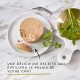 Pâté rond pour chat sur assiette blanche avec persil et fourchette ; le slogan français indique qu'il « éveillera le palais de votre chat ».