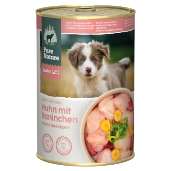 Dose Pure Nature Junior Hundefutter mit Huhn, Kaninchen, Rind, Algen und einem Welpenbild auf dem Etikett.
