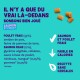 Emballage de friandises pour animaux avec fond turquoise, présentant "Il n'y a que du vrai là-dedans" et des ingrédients comme poulet, saumon et mangue.