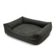 Ein dunkelgraues rechteckiges Haustierbett mit erhöhten Seiten und einer weichen, plüschigen Textur, mit einem kleinen braunen Etikett an der Seite.