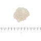 Cremefarbenes, körniges Pulverhäufchen über einem Zentimetermaß mit der Beschriftung „cm“ sowie Skalenstrichen und Zahlen.
