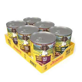 Sechserpack Josera 'Meat Lovers' Adult Dosenfutter im gelben Tray, Etiketten zeigen 'Pure Beef', 'Pure Lamb' und 'Pure Chicken'.