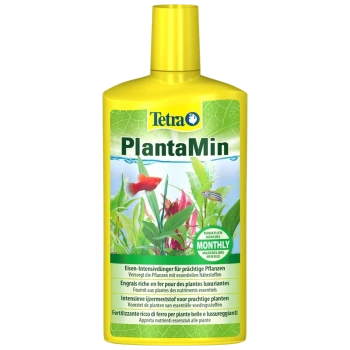 Bouteille d'engrais liquide Tetra PlantaMin pour plantes aquatiques, avec une étiquette jaune vif et un texte multilingue, y compris "Mensuel."