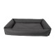 Graues rechteckiges Haustierbett mit erhöhten Rändern, das ein weiches, gepolstertes Innenleben und eine glatte Außenfläche aufweist.