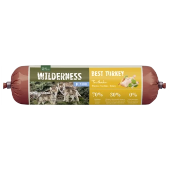 Rote, wurstförmige Tierfutterrolle mit den Aufschriften 'WILDERNESS', 'BEST TURKEY' und 'JUNIOR', zeigt zwei Wolfswelpen, ein Truthahnbild und die Angaben 70%/30%/0%.